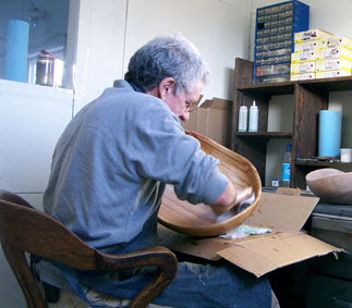 hand-oiling a nearly finished piece